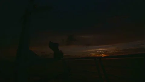 Timelapse view of the sun setting from the front of a cruise ship Stock Footage 291331528