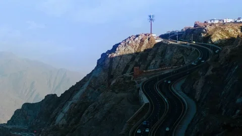 Timelapse for a view of the sunrise on Mount Al Hada, rock Stock Footage 312668099