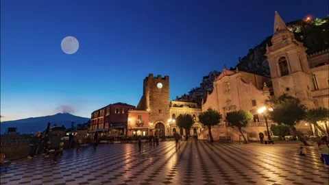 Timelapse view of Taormina at night with mount Etna and full moon (Sicily) Stock Footage 134549947
