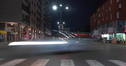 Timelapse view of traffic at an urban night intersection. Stock Footage 137271033