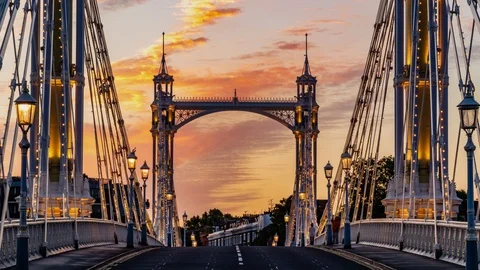 Timelapse view of the Victorian Albert bridge in London at sunset Stock Footage 92306326