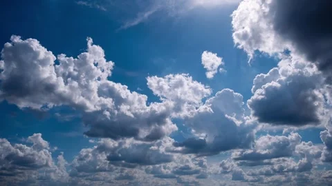 Timelapse of Voluminous Clouds Forming in Sunny Sky Stock Footage 310605628