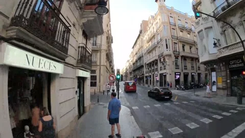 Timelapse walking down street Valencia In Spain with people 05 september 2022 Stock Footage 207779413