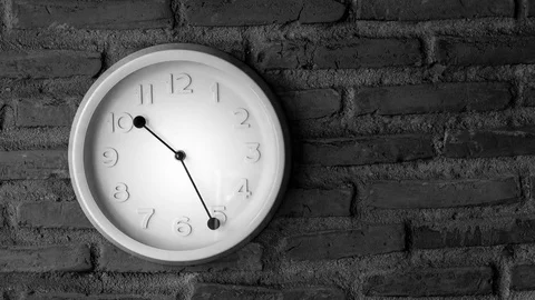 Timelapse of a wall clock with rustic wall in the background Stock Footage 79604000