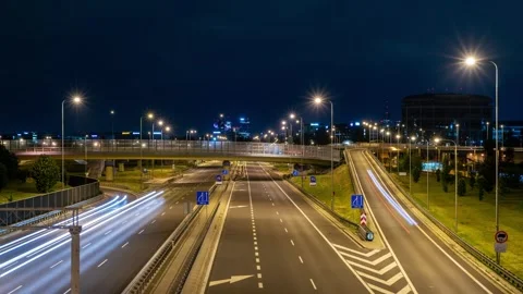 Timelapse of Warsaw Traffic at Night in Spring with Clear Sky and Streetlights Stock Footage 279059992