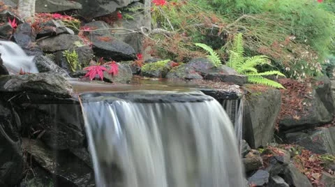 Timelapse of Waterfall in Backyard Garden in Late Autumn 1080p Stock Footage 12616950