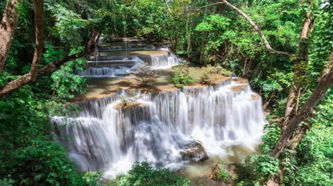 Timelapse of waterfall surround with tree in the forest in Kanchanaburi Thailand Stock Footage 68323881