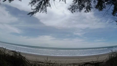 Timelapse waves on the beach using action camera fish eye lens Stock Footage 221211606