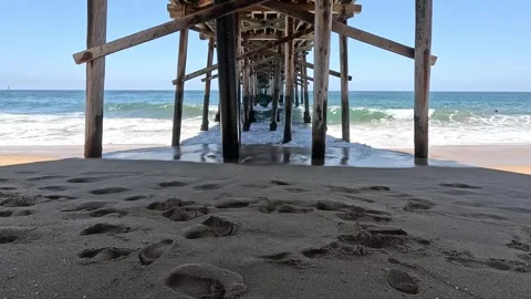 Timelapse of waves underneath Balboa Beach Pier Stock Footage 277920727