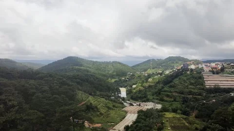 Timelapse of Weather Transition Over Lush Mountain Landscape 動画素材 313879112