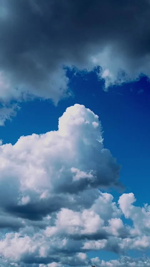 Timelapse, white, beautiful airy clouds are running against the blue sky. Stock Footage 322115502