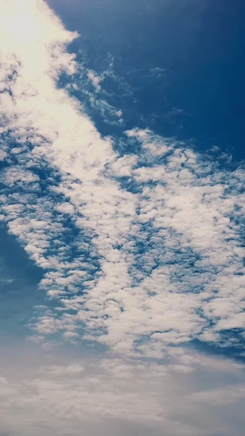 Timelapse, white, beautiful clouds are running against the blue sky. Stock Footage 319996973
