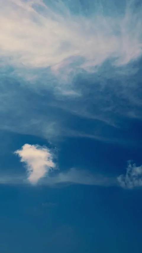 Timelapse, white, beautiful clouds are running against the blue sky. Stock Footage 320611180