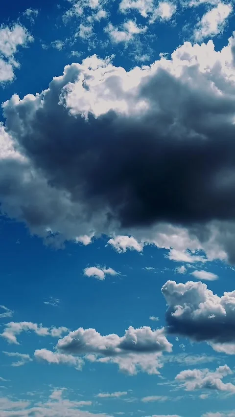 Timelapse, white, beautiful clouds are running against the blue sky. Stock Footage 321755593