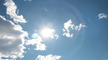 Timelapse White Boiling Clouds Bright Sun Blue Sky 2 Stock Footage 85786112