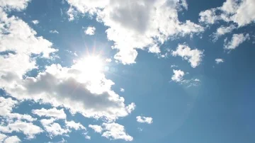 Timelapse White Boiling Clouds Bright Sun Blue Sky 3 Video stock 85788323
