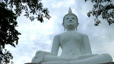 Timelapse white Buddha statue, Clouds runing background. Stock Footage 40385641