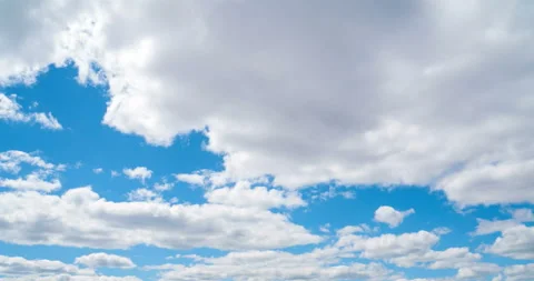 Timelapse of white clouds with blue sky in background. Stock Footage 133734698