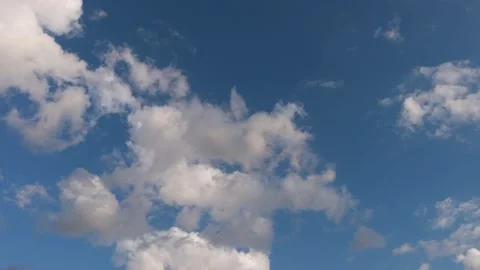 Timelapse of white clouds on blue sky Stock Footage 137824358