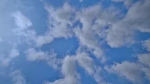 Timelapse of white clouds on blue sky in the morning Stock Footage 242759743