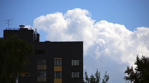 Timelapse white clouds move across the blue sky Stock Footage 113324860