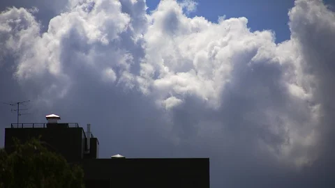 Timelapse white clouds move across the blue sky Video stock 113328257