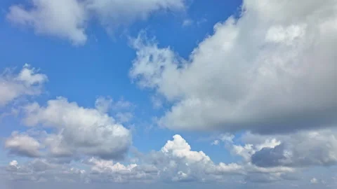 Timelapse Of White Clouds Moving Across Blue Sky Stock Footage 346266194