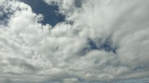 Timelapse of white clouds moving in the blue sky over tea plantations Stock-Footage 307416983