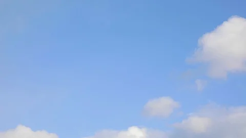 Timelapse of white coulds infront ob blue sky Stock Footage 104445483
