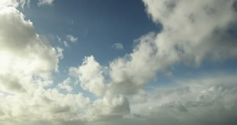 Timelapse of white cumulus obscuring the sky. Natural colors - 4K footage video. Stock Footage 150568073