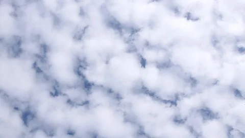 Timelapse of white fluffy clouds moving in the sky timelapse. Stock Footage 126539092