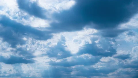 Timelapse White Fluffy Olakas Float Through the Blue Sky on a Sunny Day Stock Footage 178610131