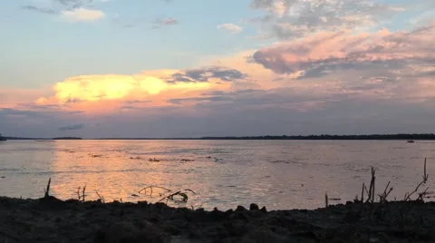 Timelapse Wideshot Amazon River Clouds at Sunset Video stock 65733053