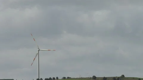 Timelapse of wind powered wind turbines with dark clouds Stock-Footage 153358640