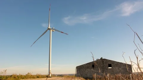 Timelapse wind turbine and renewable energy Video stock 100452369