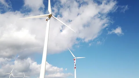 Timelapse of wind turbine under blue sky Stock Footage 270577577