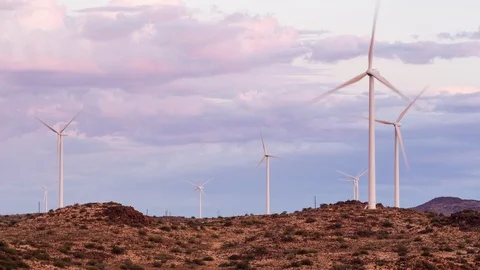 Timelapse of wind turbines in an open field Stock Footage 101655574