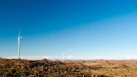Timelapse of wind turbines in an open field Stock Footage 101655953