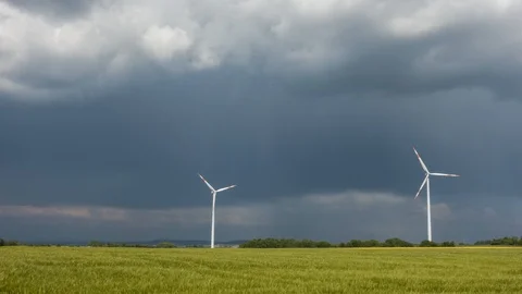 Timelapse - Wind Turbines under a partly cloudy sky Video stock 109476732