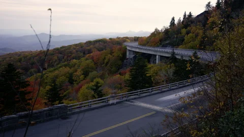 Timelapse of Winding Bridge in Mountains in Fall at Sunset  ProRes 422HQ HLG Stock Footage 167795108