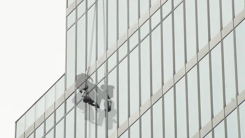 Timelapse of window cleaner on scyscraper Stock Footage 247065765