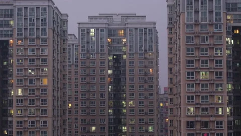 Timelapse of window light of city buildings from day To night, Beijing, China. Stock Footage 238515989