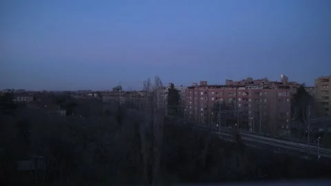 Time–lapse from a window show a winter landscape at the blue hour Stock Footage 168683238