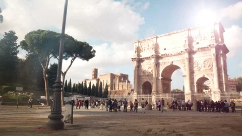 Timelapse on a windy day at the Arch of Constantine, triumphal arch near the Stock Footage 97869562