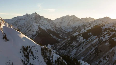 Timelapse of winter mountains and cloudy sky panorama during sunset Stock Footage 121573497
