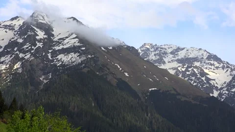 Timelapse winter mountains Balkan snowy peaks - Weather Change and Cloud Layers Stock Footage 339565541