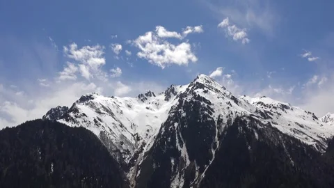 Timelapse winter mountains in Mount Aspiring - Snowy Range and Mountain Climate Stock Footage 339563895