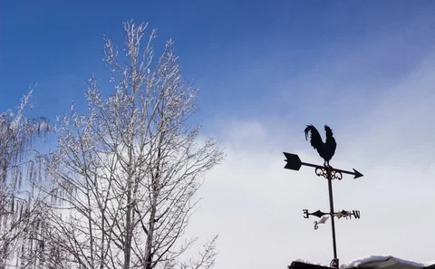 Timelapse of Winter Storm Building Behind Weather Vane Stock Footage 107806541