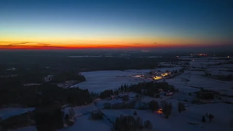 Timelapse of Winter Sunset Over Snowy Rural Landscape Stock Footage 344430247