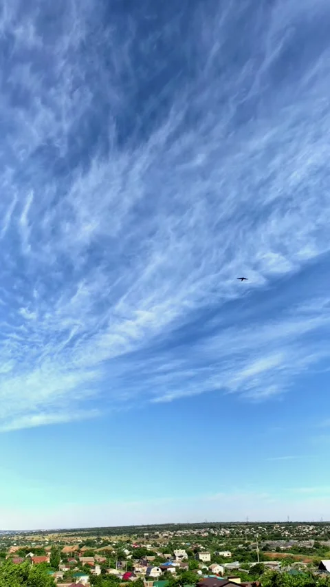 Timelapse Of Wispy Cirrus Clouds Crossing Blue Sky Stock Footage 339552558